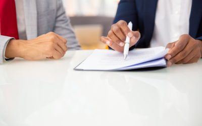 cropped-shot-business-people-reading-contract cropped-shot-business-people-reading-contract